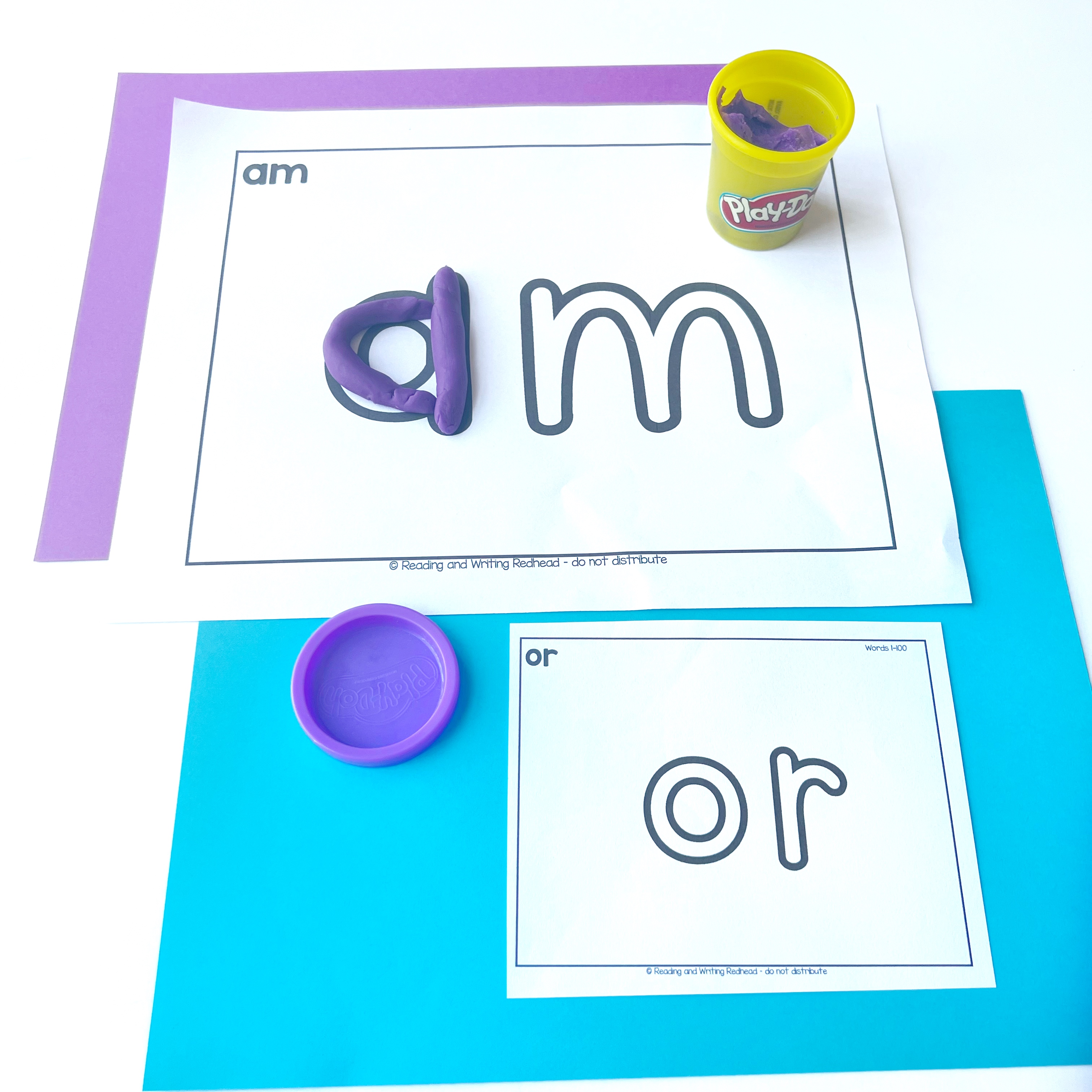 Playdoh mats in two sizes, with the words am and or on them.