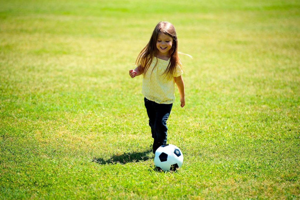 girl with soccer ball